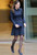 Kate Middleton in zip front jacket and pleated skirt set