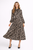 Model wearing a brown and black floral pussy-bow shirt midi dress