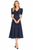 Model wearing a navy polka dot peplum fit-and-flare midi dress
