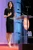 Amal Clooney in black pinstriped sheath dress
