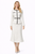 Model wearing an oatmeal tweed peplum jacket with contrast piping, matching waist belt and high-waisted A-line midi skirt