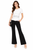 White Peplum Top & Black Straight-Leg Trouser Set