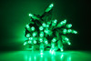 Outdoor LED Lighted Christmas Tree with a White Base and Green Tree Lights