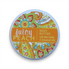 Pretty lid on a  jar of Juicy Peach Botanic Body Butter with Shea Butter and essential oils by Greenwich Bay Trading. A product of North Carolina.