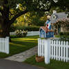 Country Blue and White Wooden Lighthouse Mailbox with Cedar Roof  at the end of a yard waiting for the mail carrier.