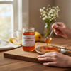 Annie’s Kitchen Quince Jelly spread on toast with fresh quince and tea in a cozy kitchen.
