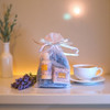 Relax with soothing Lavender Chamomile Mini Shea Butter Soap, Shea Butter Lotion, and matching Soap Saver in an Organza Gift Bag from harvestarray.com.