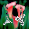 This pair of Hummingbird and Flowers Stainless Steel Earrings has a hummingbird on one earring and flowers on the other. Makes a great gift from Harvest Array.