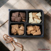 Four Flavor Homemade Toffee Sampler Gift Box  on kitchen counter. Flavors are: Butterscotch, Milk Chocolate, White Chocolate, and Peanut Butter and can't be changed.