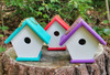 Three colors of Amish made Wren Birdhouses close up - purple, teal, and red