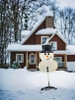 Add a festive touch to your outdoor space with our charming 10" Snowman Yard Stake.