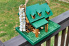 Top of the green double log cabin bird house.  Wooden and Amish made.