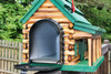 Side view of the green log cabin mailbox with door open.