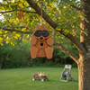 Amish Made Raccoon Shaped Birdhouse hanging in a backyard tree. Order online at  Harvest Array