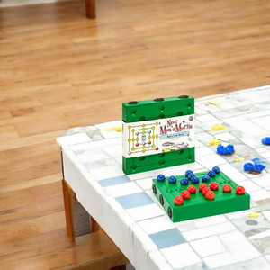 Nine Men's Morris Traveler Game on the table