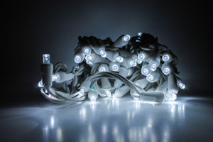 Outdoor LED Lighted Christmas Tree with a White Base and Red Tree Lights