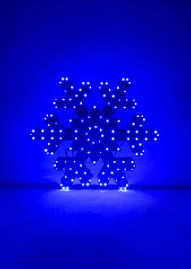 LED Lighted Snowflake lit up in the dark