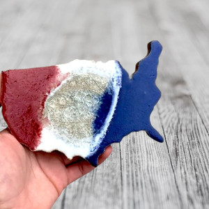 The USA Shaped Crackle Coaster is larger than a regular square coaster.