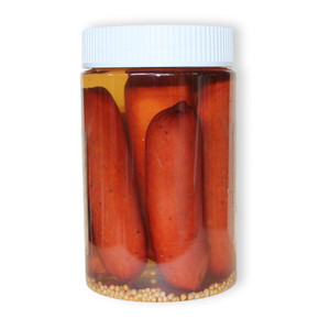 View of the Dutch Kettle Amish Home Style Mild Pickled Sausage from the back of the jar.