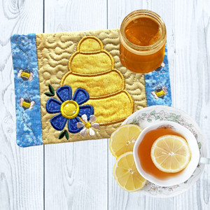 Choose our Bee Hive Oversized Coaster that is embroidered and quilted with love or Harvest Array. Made in America.