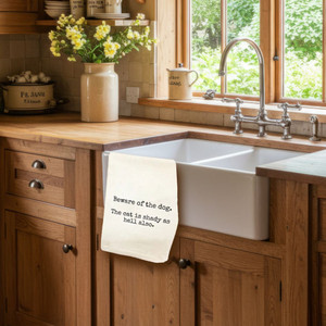 This towel makes dish duty more laughable with the words, "Beware of the dog. The cat is shady as hell also" printed on it. Order today at Harvest Array.