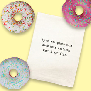 Dare to dream big while tackling kitchen spills and stains with our "My career plans were much more exciting when I was five." dish towel. Made in the USA for Harvest Array.