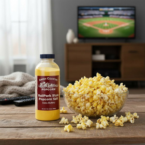Amish Country Ballpark Style extra buttery popcorn salt with fresh bowl of popcorn in living room setting