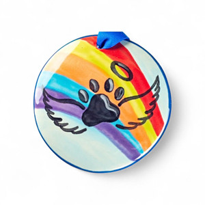 3.5" diameter Hand Painted Rainbow Bridge Ornament-pawprint with wings and halo over a rainbow design.