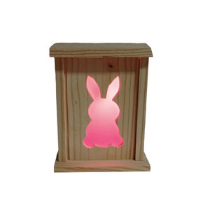 Spring or Easter Decoration Pink Rabbit Design Rustic Wood LED Lantern with a C7 white LED 120 volt bulb and 6' cord included. For indoor/outdoor use.