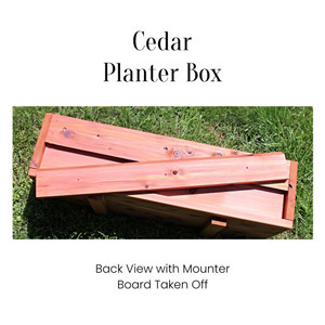 Harvest Array Exclusive Cedar Planter  from M&M Enterprises showing the Back view  of the Planter Box  with the mounting board taken out and placed  on top of the box.