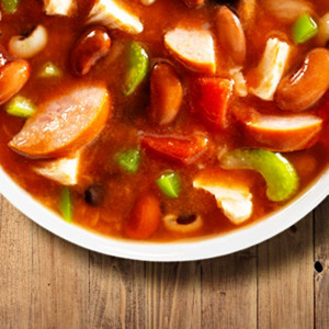Finished product of a steaming hot bowl of Minnesota Heartland Eleven Bean Soup Mix
