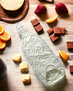This clear Cheese Platter with a dragonfly design is made from a recycled wine bottle! Available at harvestarray.com.