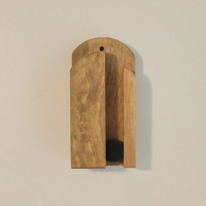 Oak wood Amish-Made Wall-Mount Broom Holder on the wall