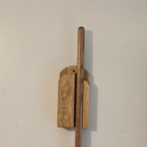 Step 11: Fully push the broom handle as far up as you want into the broom holder.