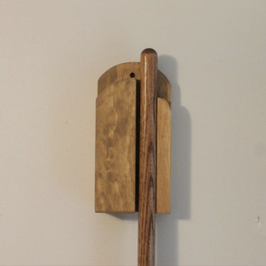Step 10: Broom Handle tip above the top of the  Amish-Made Wall-Mount Broom Holder