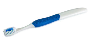 Textured Grip Youth Toothbrush in blue. Closeup detail of textured grip kids will love.