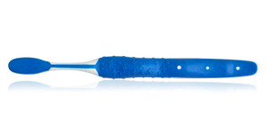 The back view of the Textured Grip Youth Toothbrush, made in the USA.