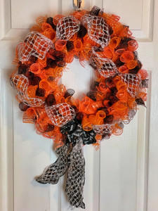Handmade Orange and Black Deco Mesh Wreath perfect as a Halloween decoration or to show pride in your favorite sports team.