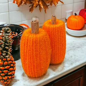 Small Orange Yarn Pumpkin with Cinnamon Stick Stem.