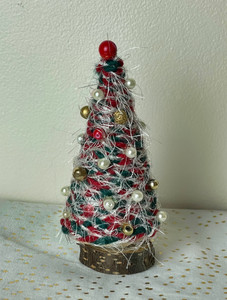 Handcrafted Furry Christmas Trees will brighten your Christmas décor . Made with wood and colored yarn.