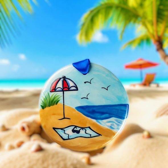 Hand Painted Beach Scene Ceramic Ornament by Nola Watkins is available in limited quantiles at www.harvestarray.com.