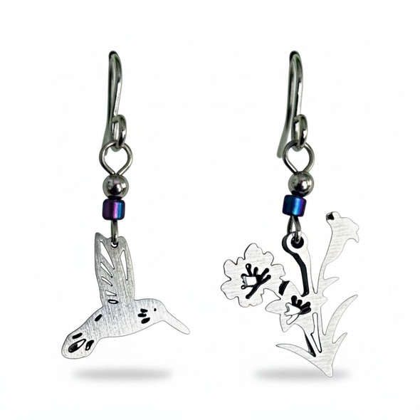 Hummingbird and Flowers Stainless Steel Earrings has a hummingbird on one earring and flowers on the other. Makes a great gift from Harvest Array.