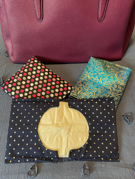 Premium tissue holder for car and purse. Keep your tissues clean and secure with our stylish and practical Tissue Keepers. Holds 10-12 tissues.