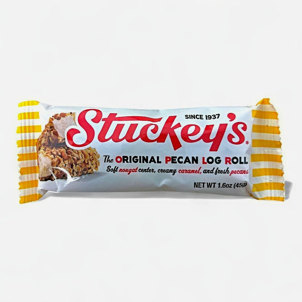 Stuckey's pecan log roll candy bar with soft vanilla nougat center, creamy caramel, and fresh pecans. A nostalgic original. Available from www.harvestarray.com.