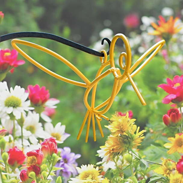 Close up of the yellow Powder Coated Metal Hanging Hummingbirds. Hang it in your garden by a Shepherd's hook.
