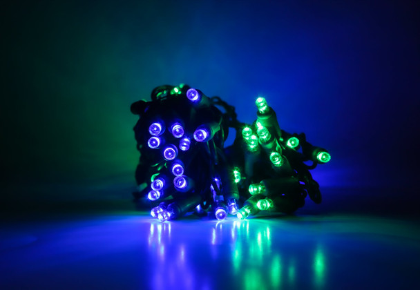 Outdoor LED Lighted Christmas Tree with Green Base and Green and Blue Tree Lights
