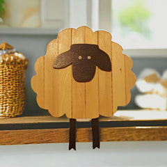 Handmade Sheep with dangling legs decoration.