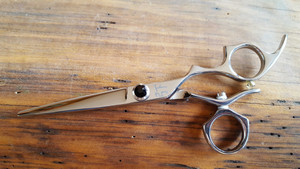 Shear Fanatic stainless steel swivel hair shears with ergonomic rotating thumb handle – 5.5-inch Japanese 440C steel professional scissors. Shear Fanatic stainless steel swivel hair shears with ergonomic rotating thumb handle – 5.5-inch Japanese 440C steel professional scissors.