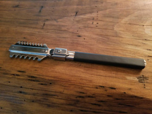 Shear Fanatic™️ Scissor Shear Fanatic®️ Korean Made Stripping Texturizing Comb, stainless steel and black handle hair cutting tool.