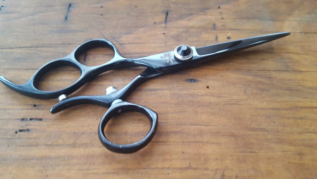 Shear Fanatic™️ Scissor Black Titanium Left Hand Swivel Shear - Professional Left Hand Swivel Scissors for Stylists, black titanium finish with ergonomic design and swivel thumb for comfort.